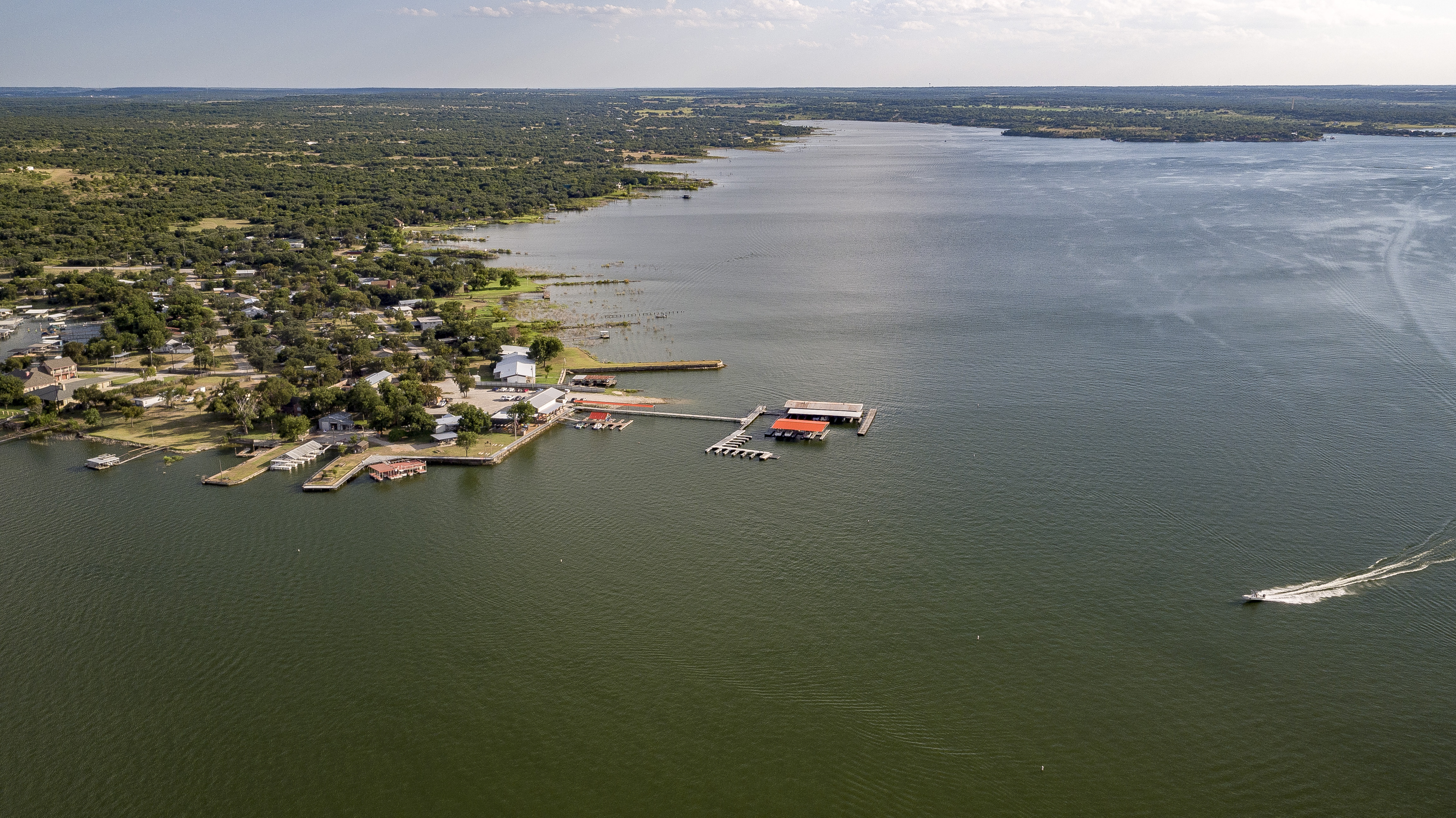 aerial shot of lake brownwood and pier