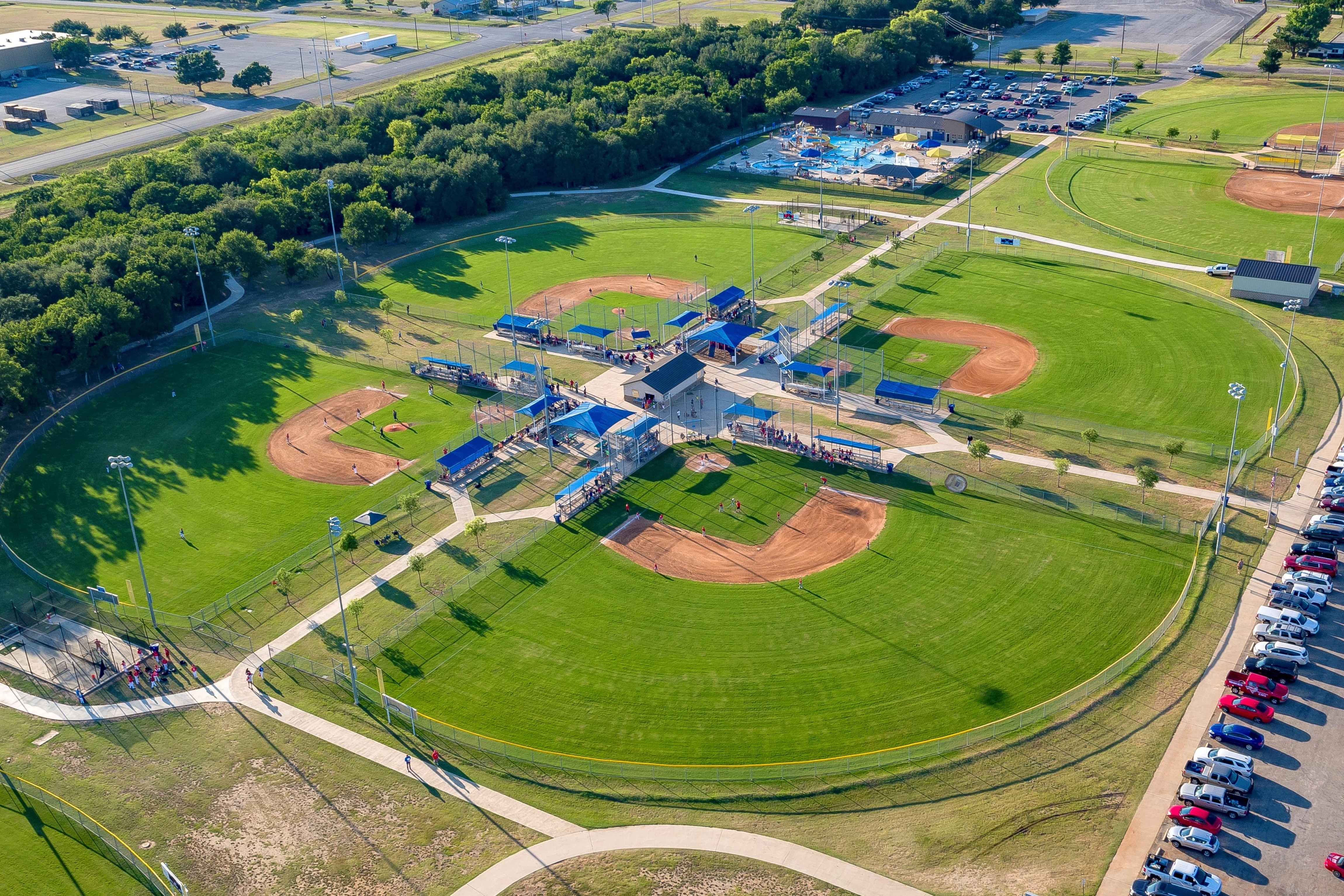 aerial photo of 4 baseball diamonds